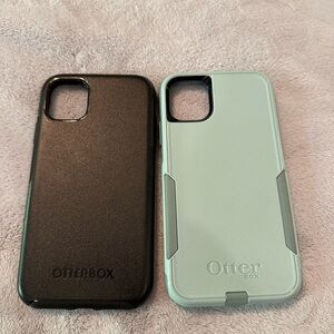 2 otter box iPhone 11 phone cases. Symetry and commuter.